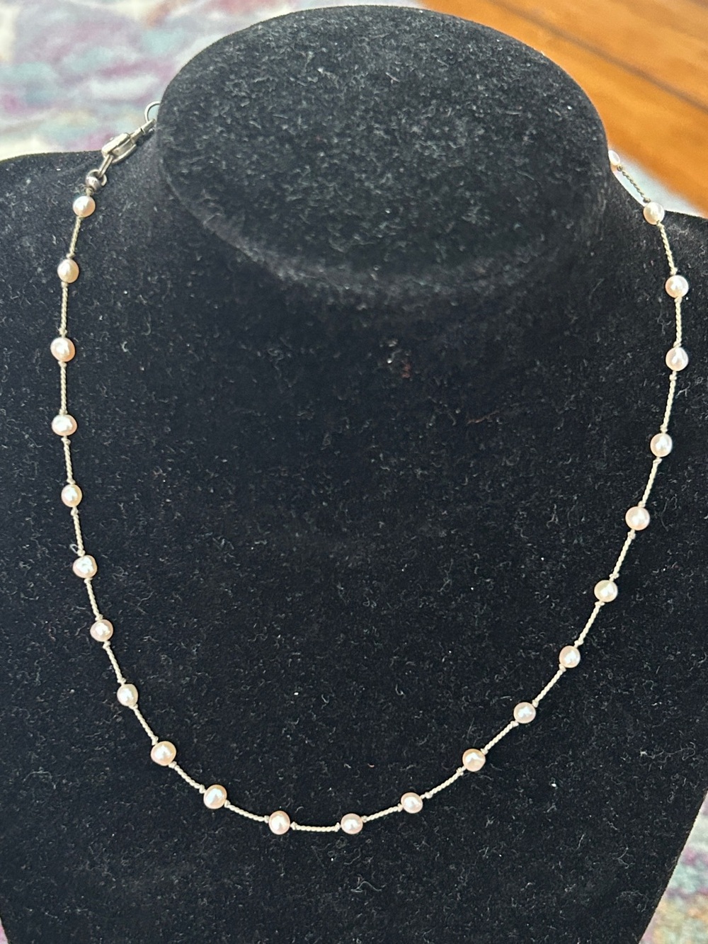 Vintage dainty pink pearl necklace with Sterling heart clasp.